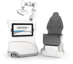 Boston hair transplant clinic offers ARTAS iX robotic machine for robotic hair transplant procedures.